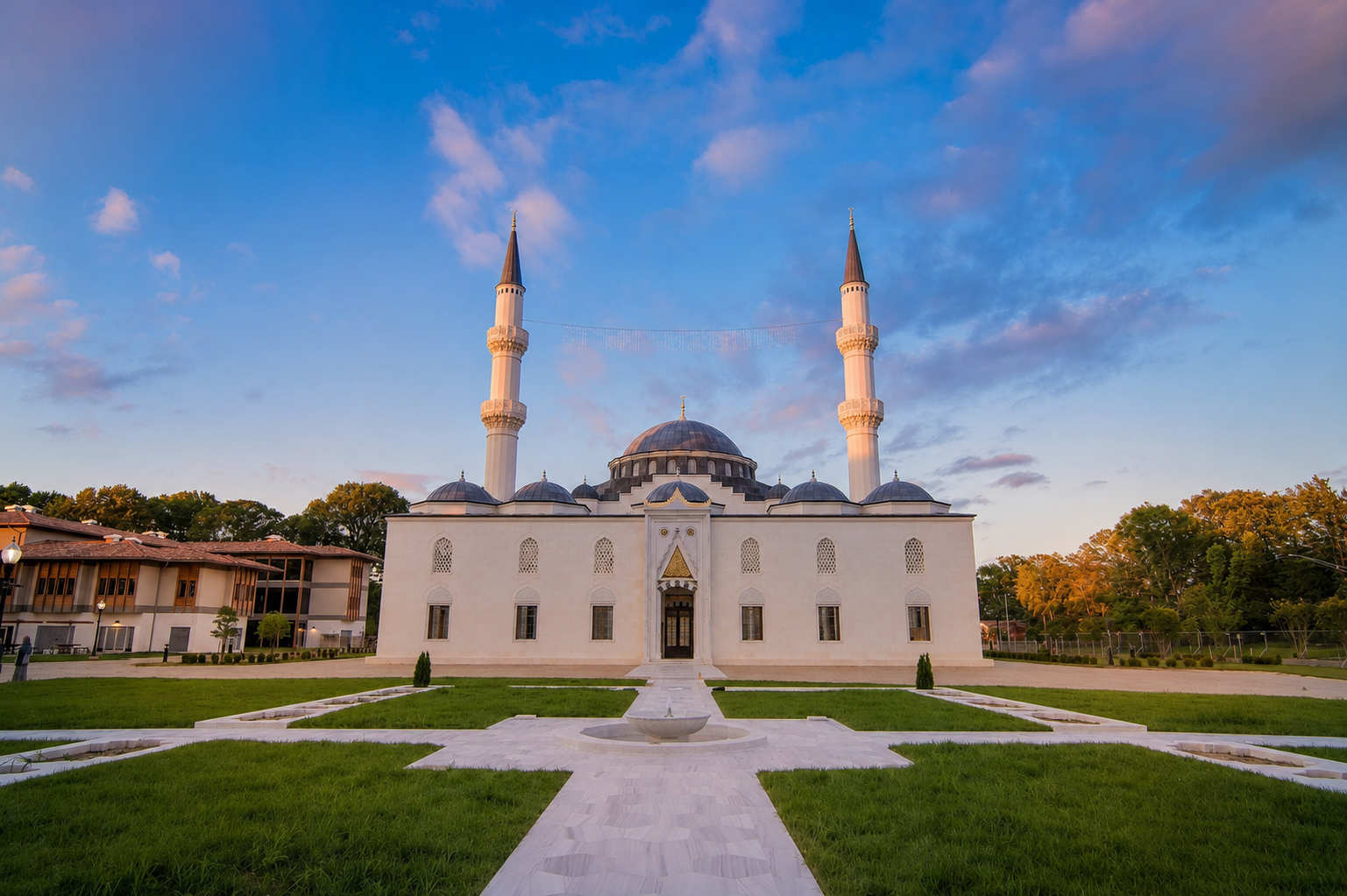 The mosque at the Diyanet Center of America beneath an evening sky